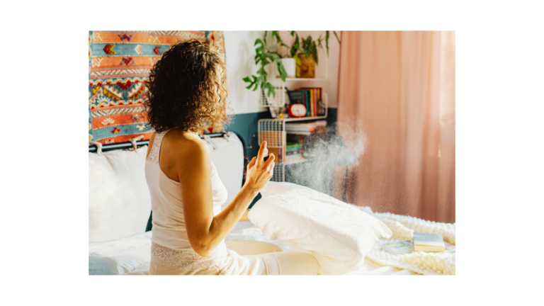 Healthy Home look with lady spraying mist in beddroom